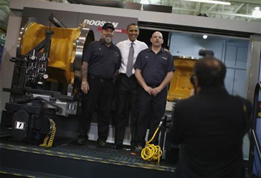 Obama takes manufacturing message on the road, to truck plant