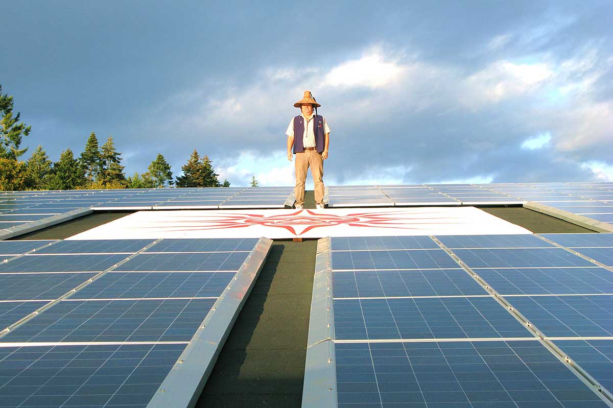 Chief-Standing-on-Solar-roof